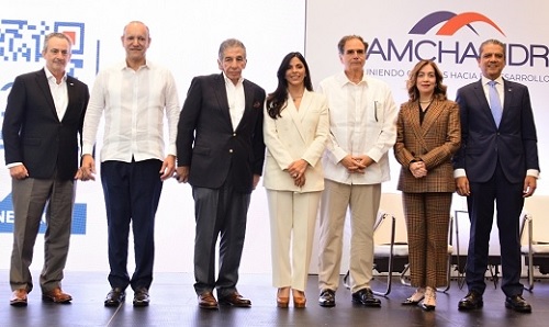 Foto empresarios en Santiago y Cámara Americana